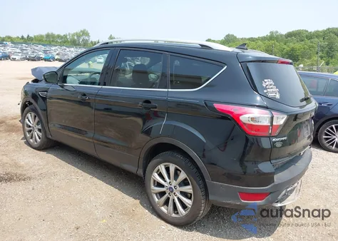 2018 Ford Escape Titanium z USA, uszkodzony, nr VIN 1FMCU9J98JUC67847